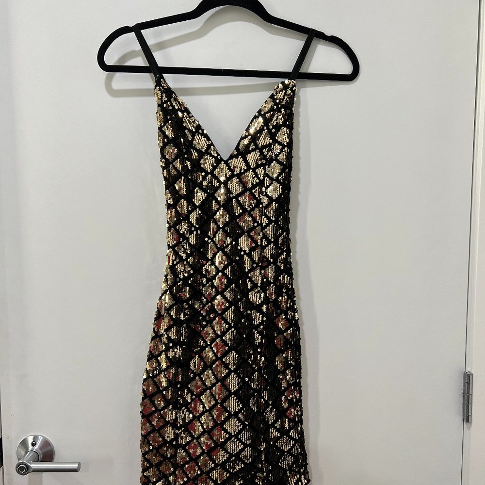 Black and gold seqin dress